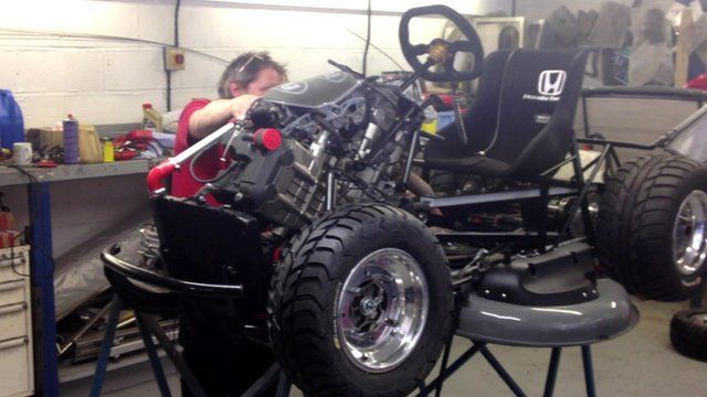 Testing the lawnmower's souped-up engine