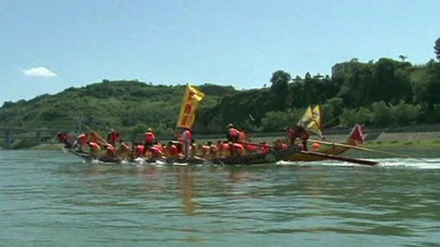A boat racing in the Dragon Boat Festival