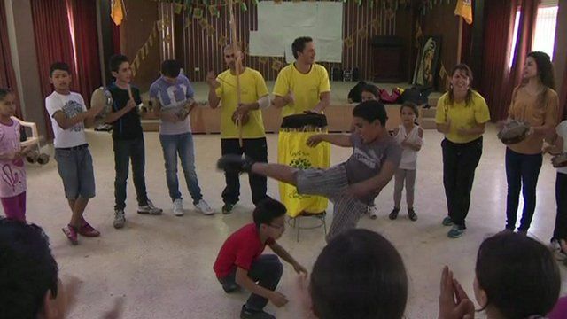 Palestinian boys and girls learning capoeira