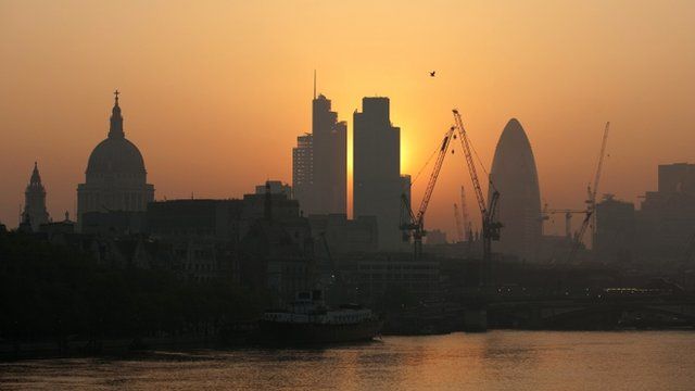 Sun rises over City of London