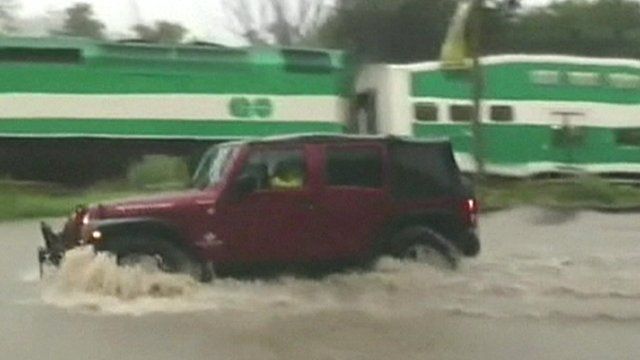 Vehicle driving through flood water