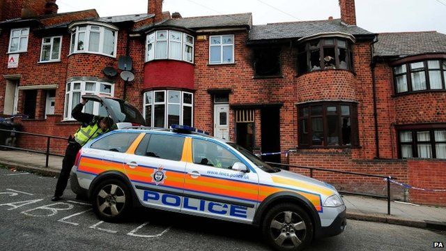 Police car outside fire house