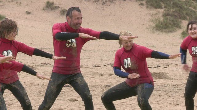 Surfing lessons on a beach