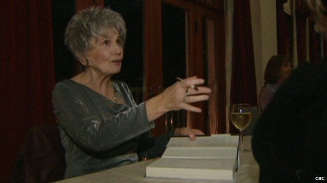 Alice Munro signing books