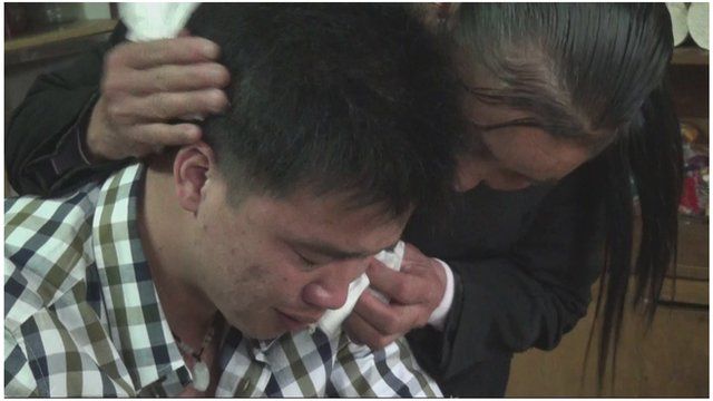 Luo Gang comforted by his biological mother