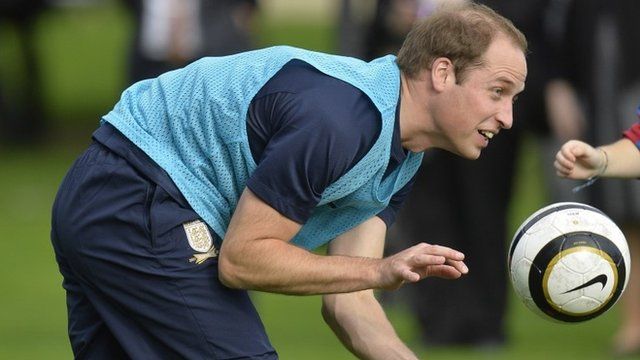Prince William, Duke of Cambridge trains with players in the grounds of Buckingham Palace to mark the Football Association's 150th anniversary