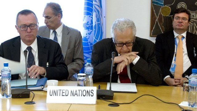 Lakhdar Brahimi (second from right) before today's talks