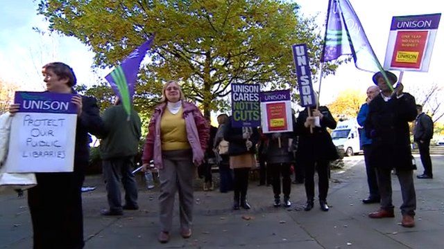 People protesting outside Nottinghamshire County Council against job losses and budget cuts