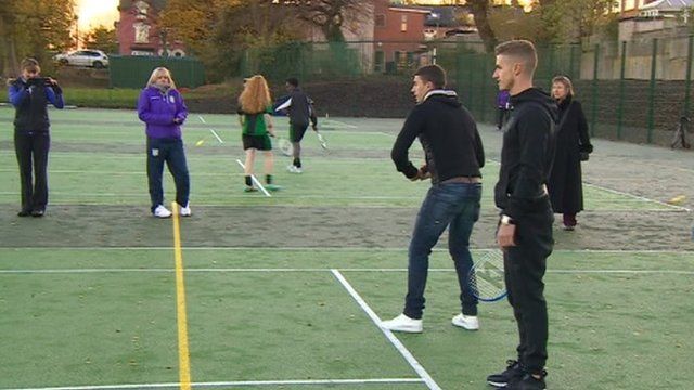 People playing tennis