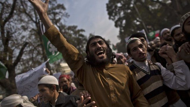 A supporter of the Pakistan Defence Council
