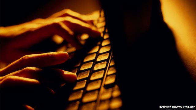 Person typing on a computer