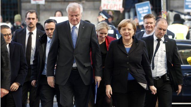 Horst Seehofer (CSU) and Angela Merkel (CDU) arrive for a meeting with the SPD