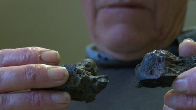 Lawrence Parkin with his suspected meteorite