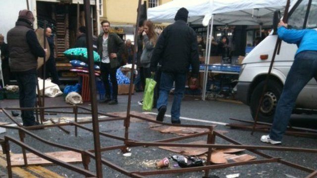 Market traders cleared up the aftermath