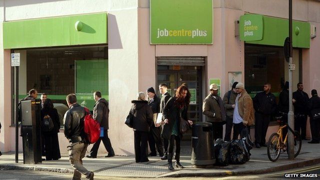 People queue outside a Job Centre