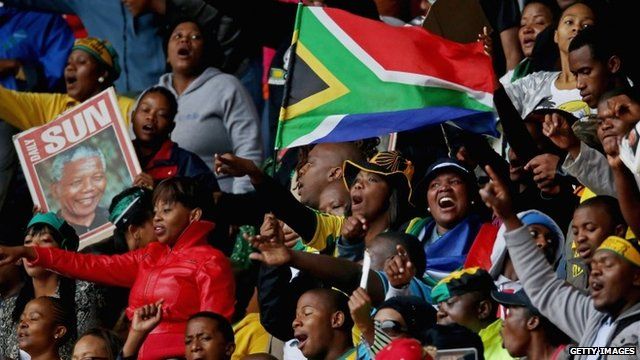 People in stadium for Mandela memorial