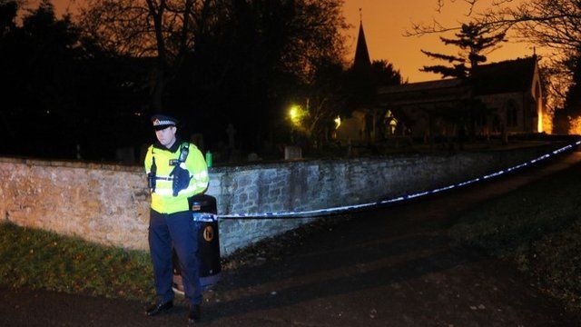 Police officer at scene of search
