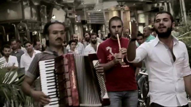 The band Wamda performing on the streets of Damascus