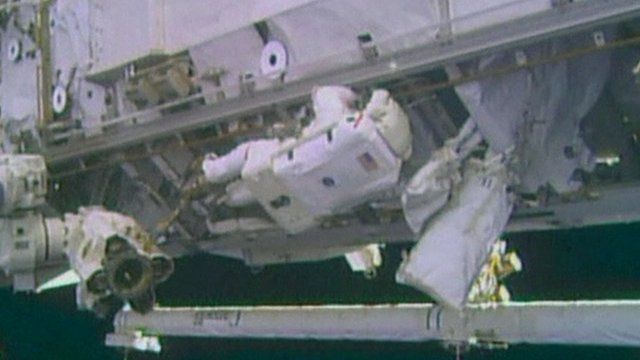 Astronaut working on exterior of International Space Station