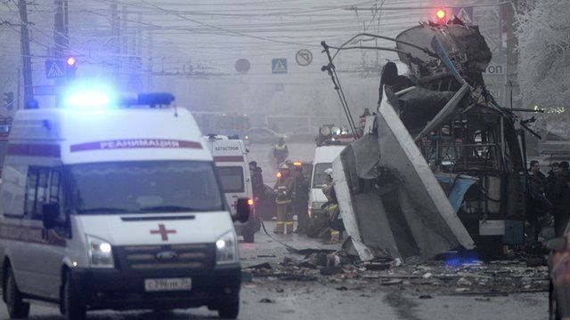 Members of the emergency services work at the site of a bomb blast on a trolleybus in Volgograd, Russia