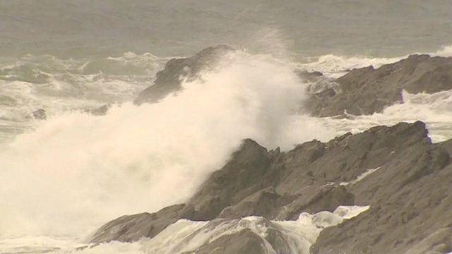 Waves crashing on rocks