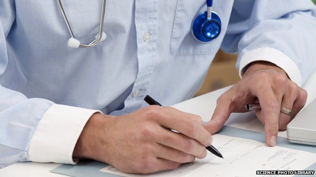 Doctor writing notes