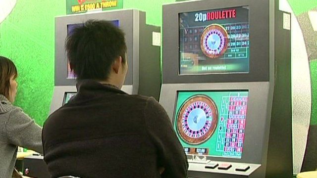 Man on a roulette machine