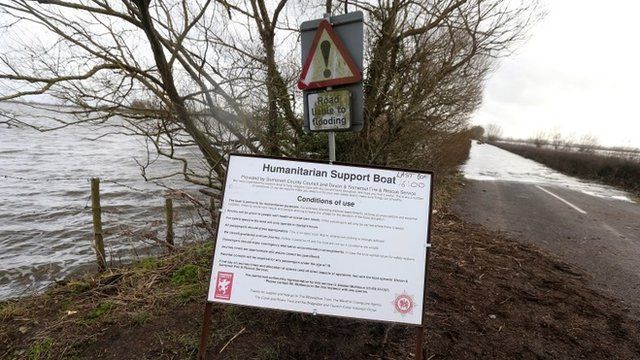 Information sign on flooded road