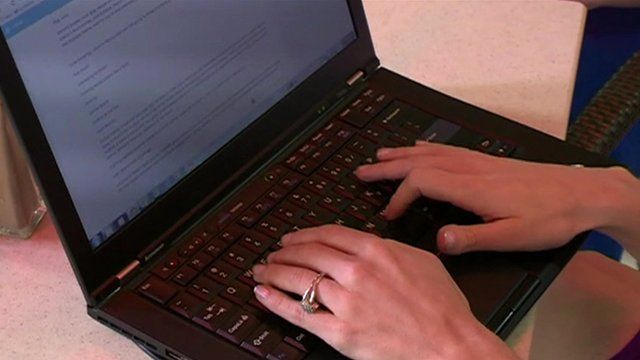 woman using laptop