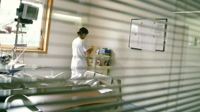 Nurse in hospital room