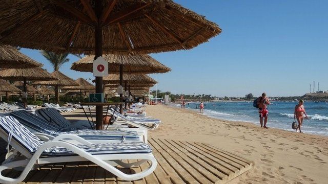 Empty reclining chairs are seen on the beach in the Egyptian Red Sea resort of Sharm el-Sheikh