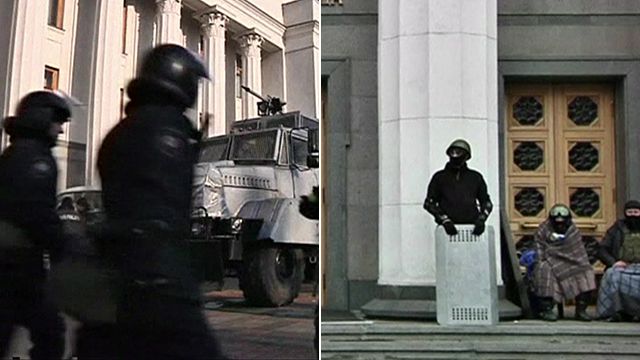Riot police outside parliament on Friday and 'self defence' guards outside on Saturday