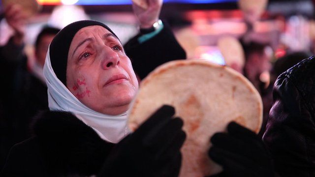 A woman holding bread