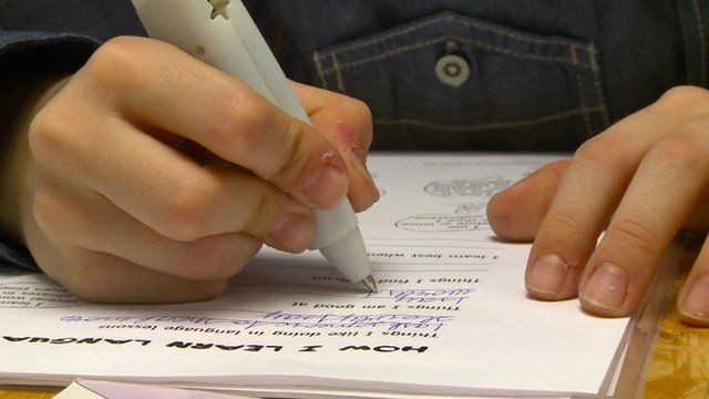 A child using a vibrating pen