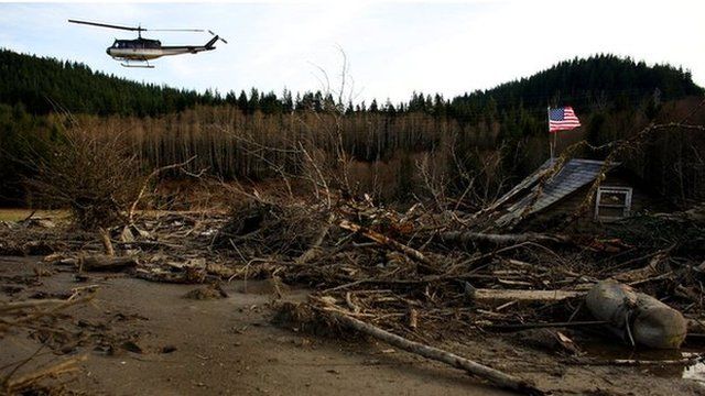 Helicopter over damage caused by US mudslide