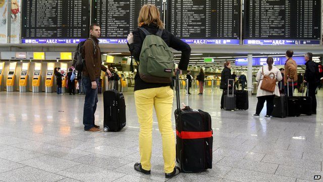 People in an airport terminal