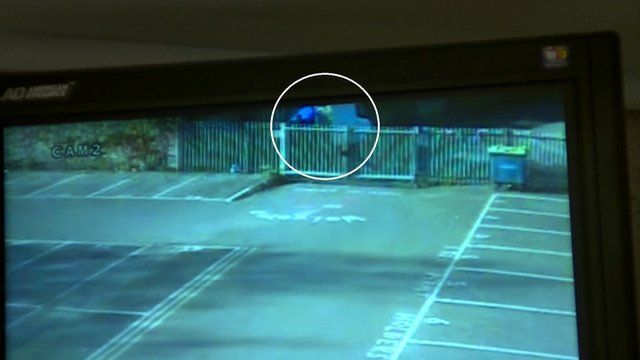 A still image from CCTV shows a van and a man dressed as a workman - said to be Banksy