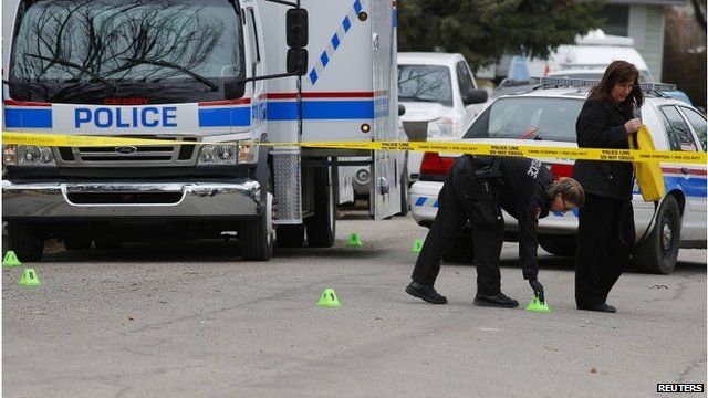 Police officers at scene of mass stabbing in Calgary