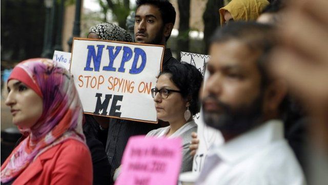 Muslim protesters demonstrating against spying programme
