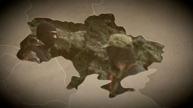 Map of Ukraine with image of masked militia inside.