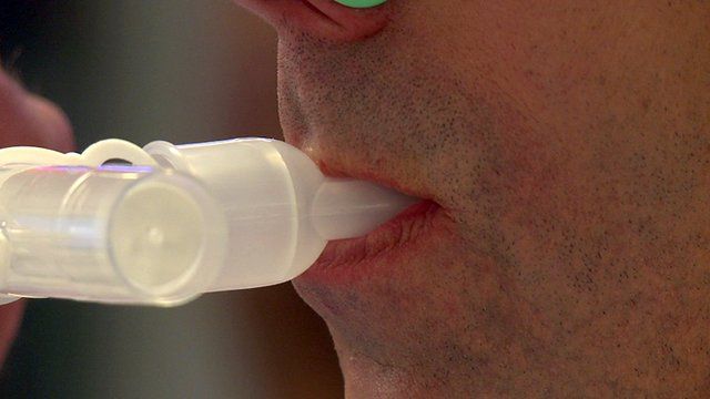 A man using a Breezing device