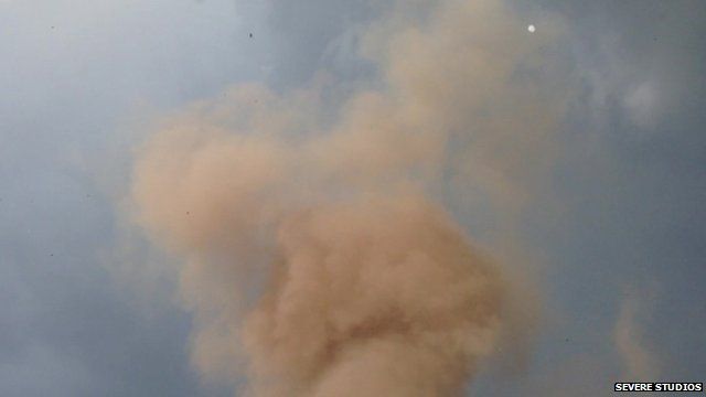 Still from amateur footage shows smoke rising