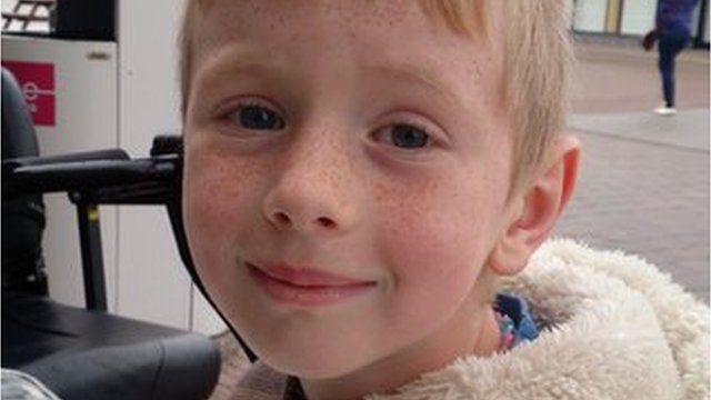 Logan Crawford, who was seven, died after falling from cliffs in Ballycastle