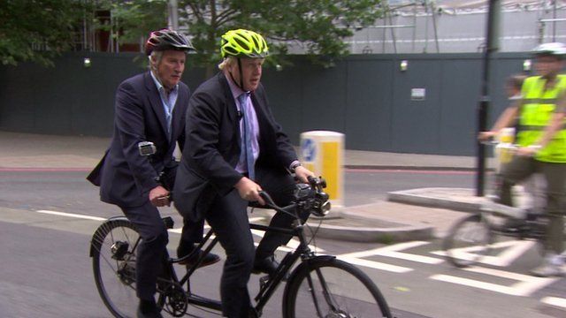 Jeremy Paxman and Boris Johnson on a tandem