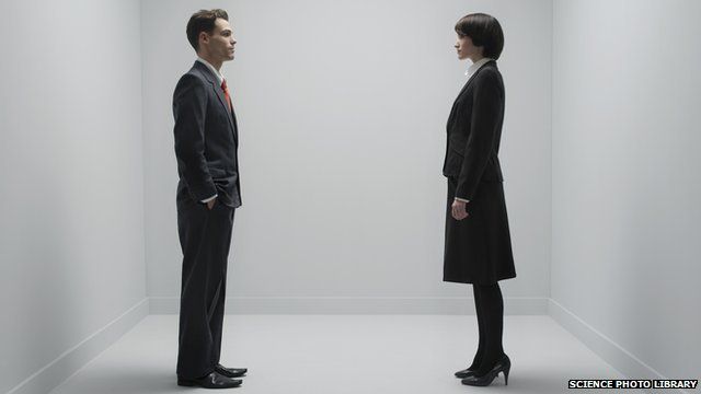 A man and woman standing up