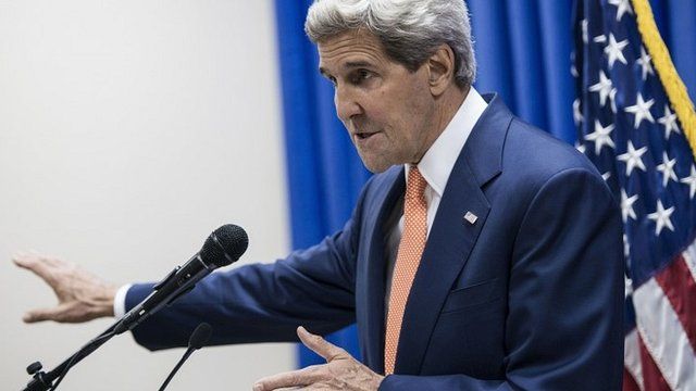 John Kerry at press conference in Baghdad