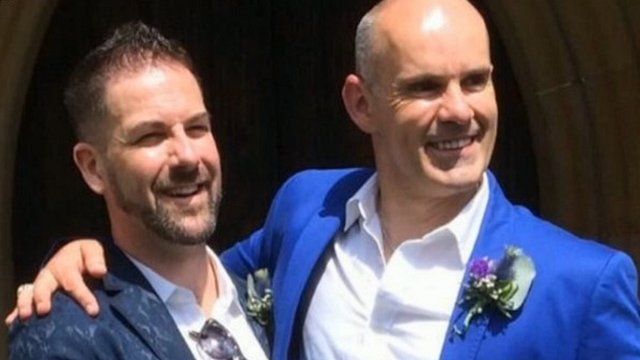 Reverend Andrew Foreshew-Cain (right) with his husband