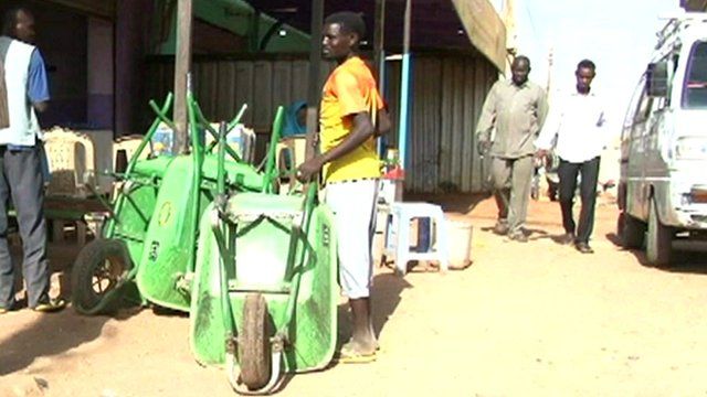 Wheelbarrow user in Khartoum