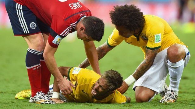 Neymar of Brazil lies on the field after a challenge