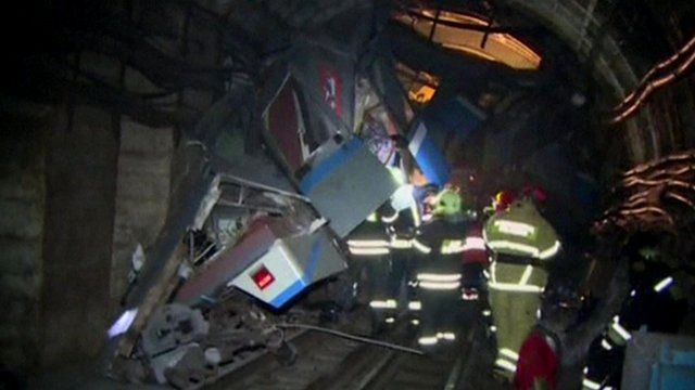 emergency workers at scene of derailment